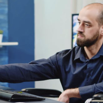 Man with a disability working at a computer